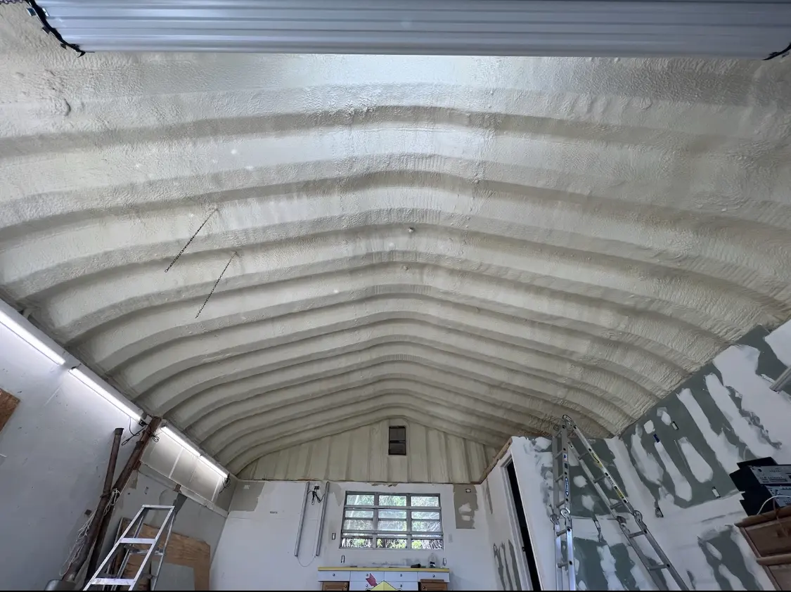 Spray polyurethane foam applied to the underside of a metal roof deck in Yulee